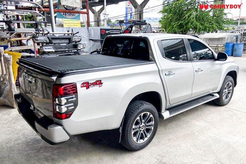 Silver Mitsubishi Triton double cab with the Softlid closed