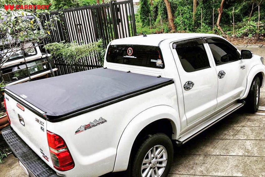 White Toyota Vigo Champ double cab with the Softlid closed