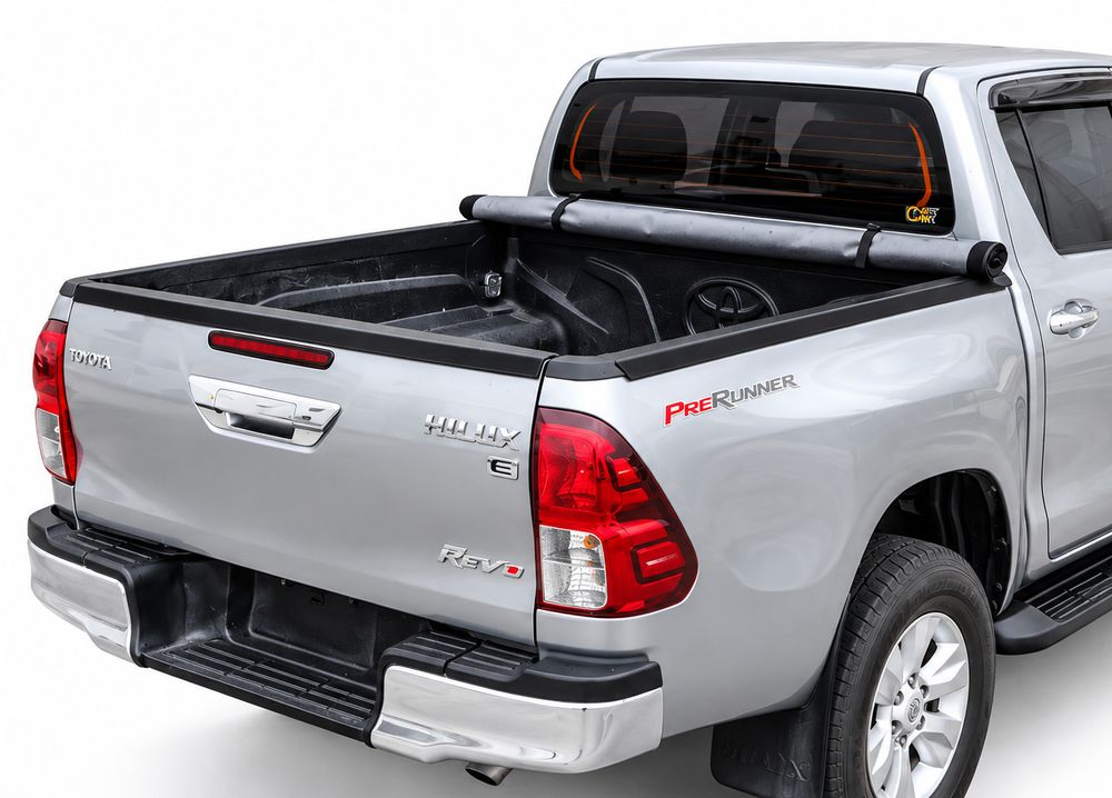 Softlid Lite rolled up and strapped behind the cab, tray open